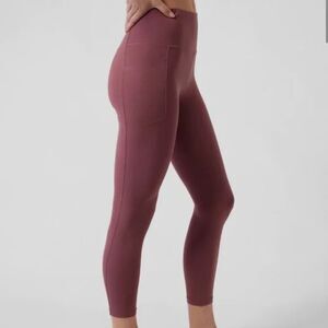 ATHLETA TAWNY ROSE SALUTATION STASH POCKET ll 7/8 EUC  Size Small